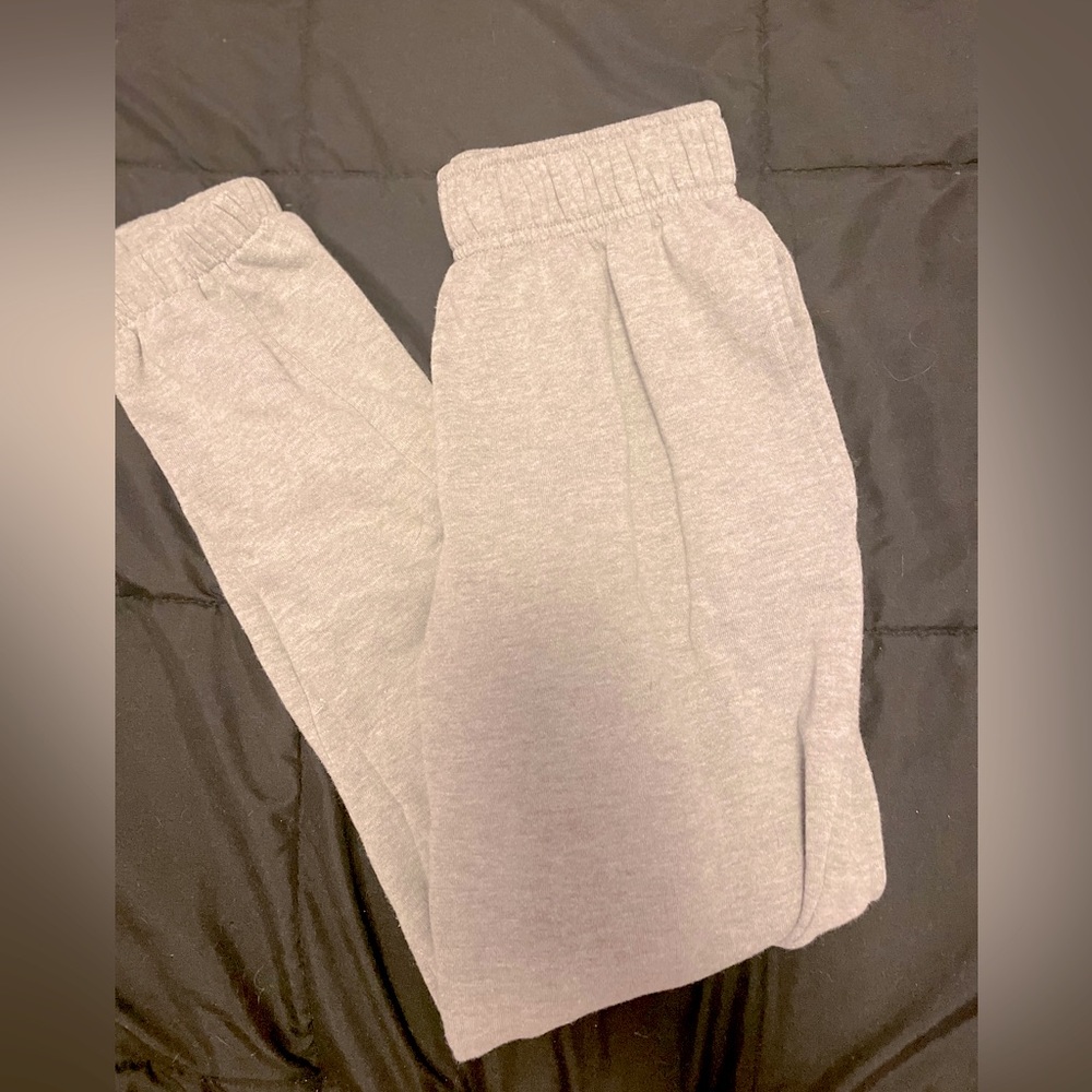 brand is athletic works, grey, no rips or holes. Small (28-30)